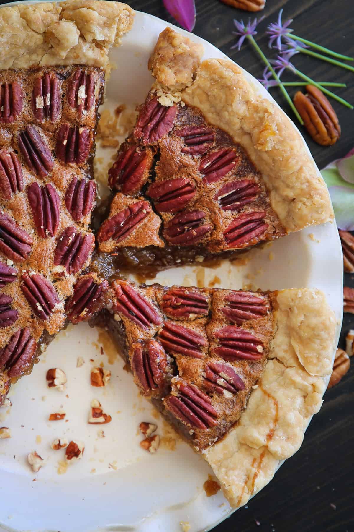 Classic Homemade Pecan Pie Pecan Pie in a white pie dish.