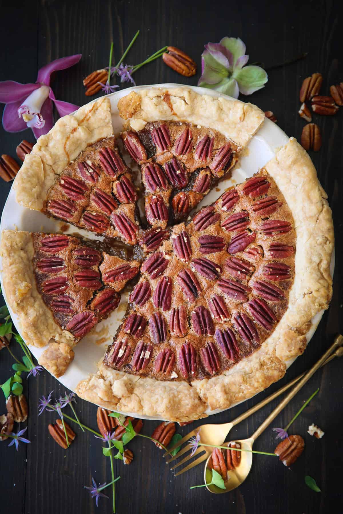 Classic Homemade Pecan Pie Pecan Pie in a white pie dish.