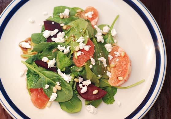 Spinach salad with beets, goat cheese, pine nuts, grapefruit