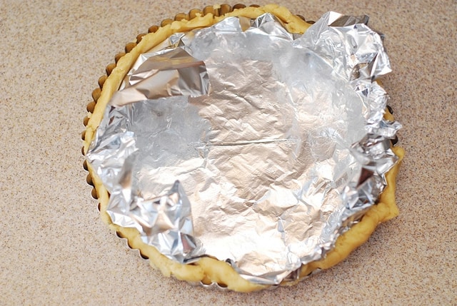 adding aluminum foil on top of sweet tart 