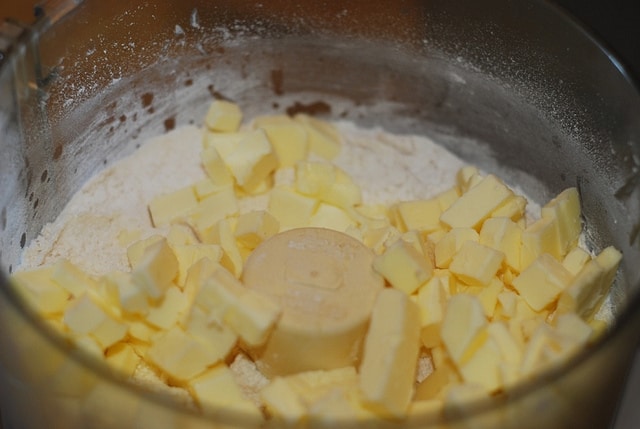 chopped butter in food processor for tart crust
