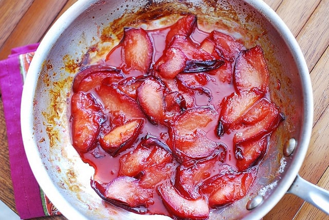 plums cooking in butter and sugar