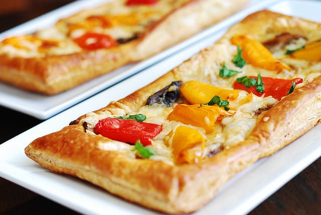 puff pastry pizza with mushrooms, bell peppers, cheese