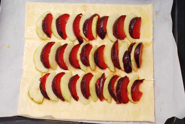 plums and apples on puff pastry sheet 1