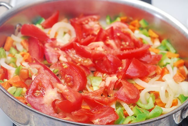 add tomatoes to the stew