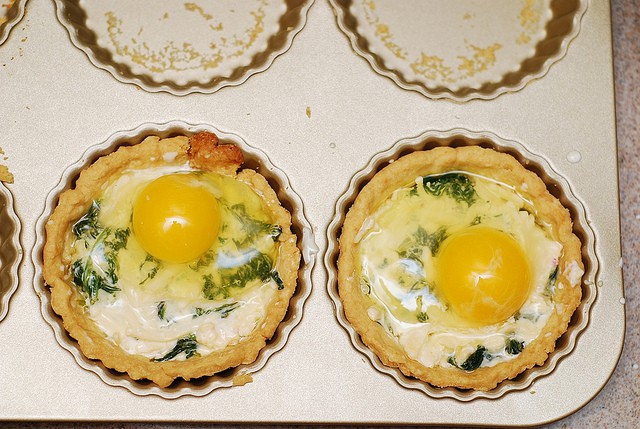 tart shells with egg on top