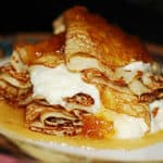 Crepes with ricotta cheese filling and pears roasted in butter and honey