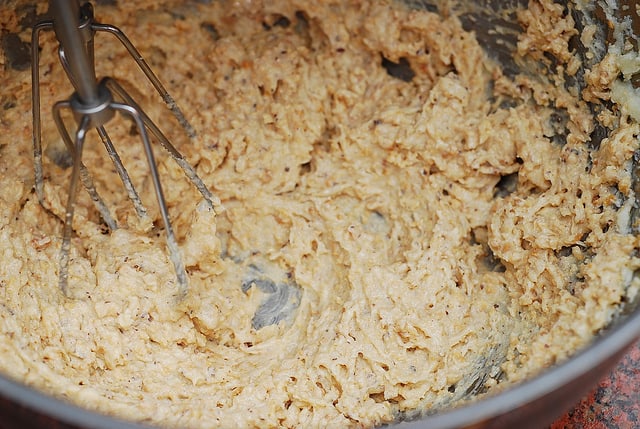 mixing ground hazelnuts into the batter