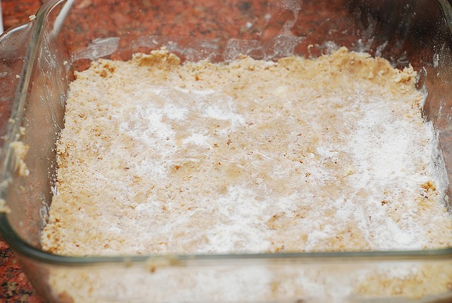 Press half of the dough onto the bottom of the baking pan