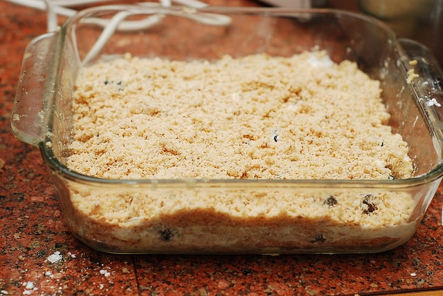 Crumble the other half of the dough over blackberries