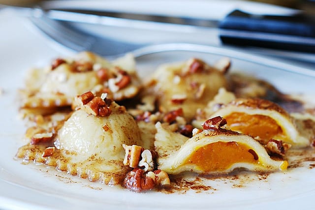 Pumpkin ravioli with brown butter sauce and pecans
