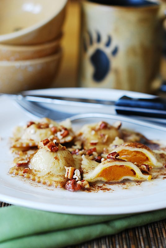 Pumpkin ravioli with brown butter sauce and pecans