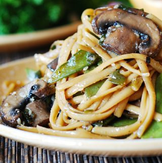 spicy asian noodles with mushrooms and peas