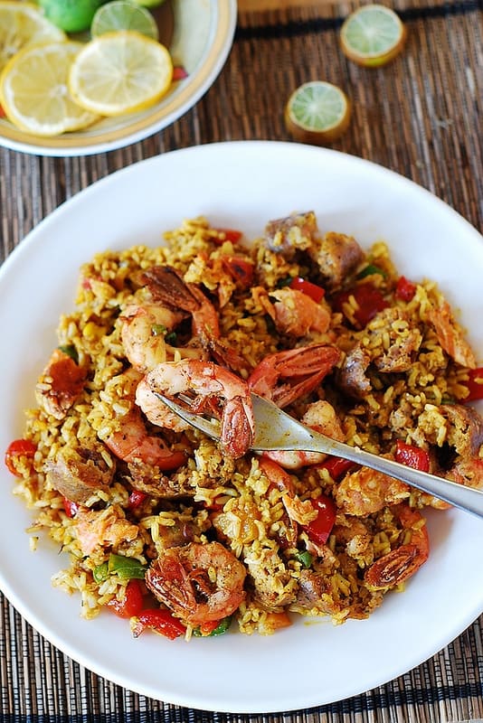 Paella with chicken, shrimp, and sausage, and bell peppers