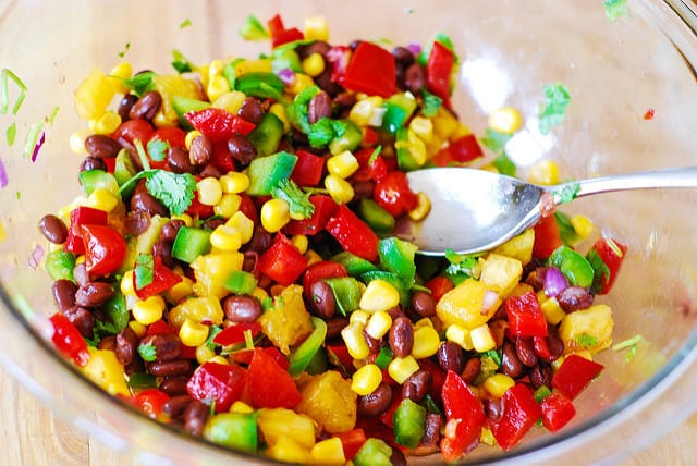 Southwestern salsa with black beans, corn, and pineapple in a bowl
