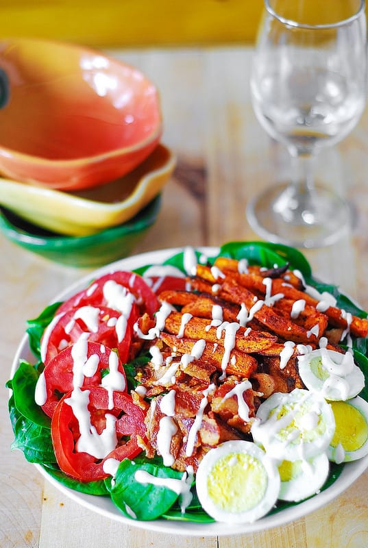 Sweet potato fries, spinach, bacon, eggs, tomato salad with mayo-based dressing