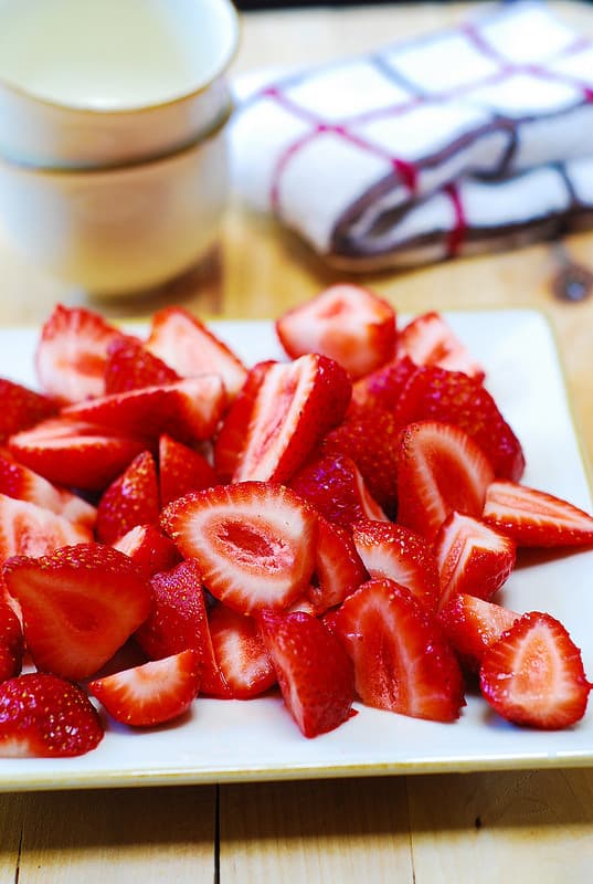 sliced strawberries on a plate
