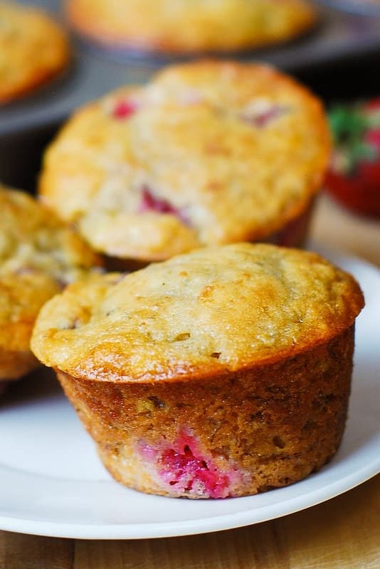 Strawberry Banana Bread muffins on a white plate