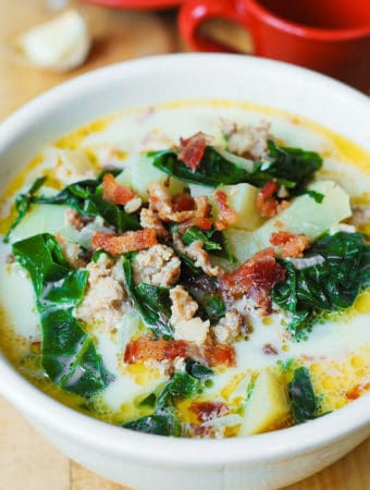 Olive Garden's Zuppa Toscana Soup (copycat recipe) made with Swiss Chard, Italian sausage, potatoes, and bacon - in a bowl.