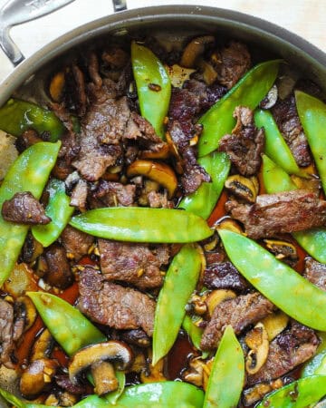 Asian Beef with Mushrooms and Snow Peas.