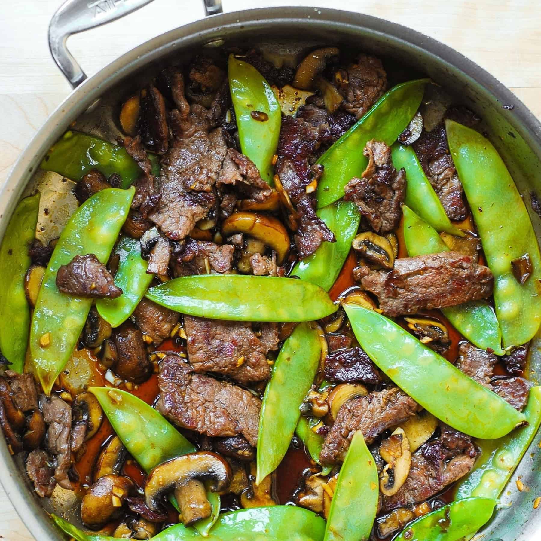 Asian Beef with Mushrooms and Snow Peas.