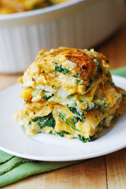a slice of butternut squash spinach lasagna on a plate