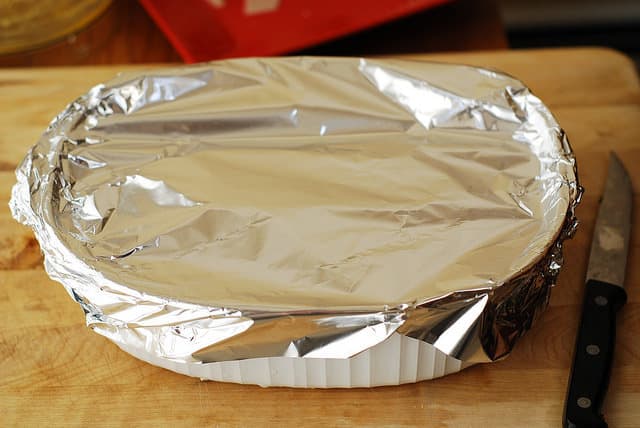 Cover lasagna dish with foil