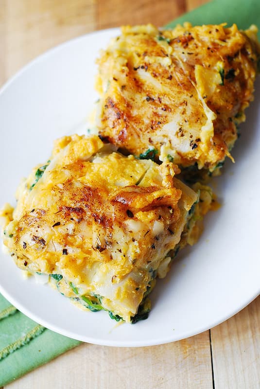 2 sliced of butternut squash and spinach lasagna on a plate