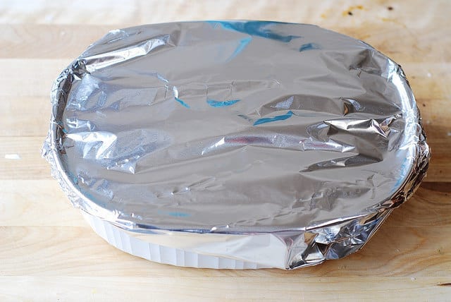 Cover the casserole dish with aluminum foil