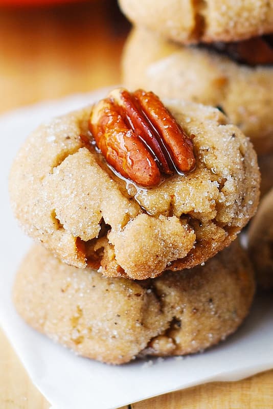 Browned Butter Pecan Cookies with Pecans on top and brushed with maple syrup