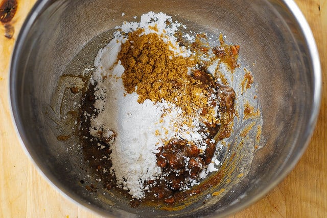 adding sugar, half and half, and vanilla to browned butter and pecans (step-by-step photos)