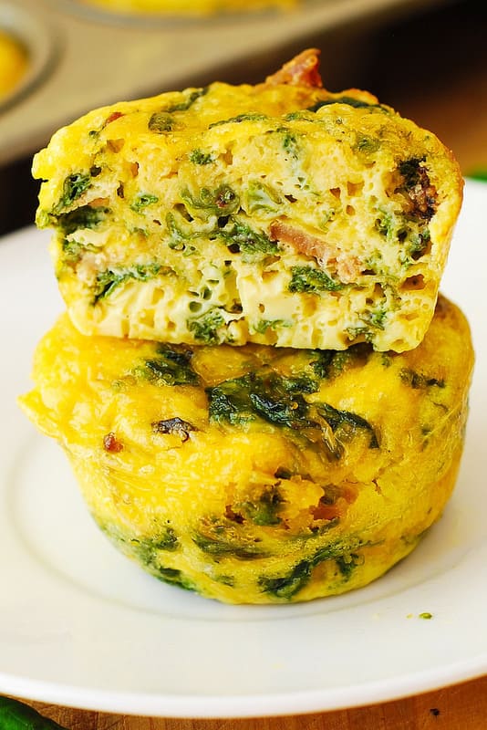 breakfast egg muffins with bacon and spinach and parmesan cheese
