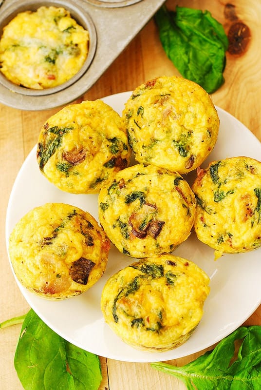 Breakfast Egg Muffins with Mushrooms and Spinach - on a plate.