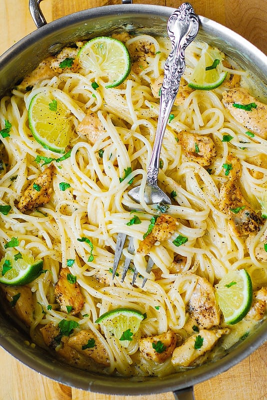 Chicken Pasta with Creamy Cilantro-Lime Sauce in a stainless steel skillet