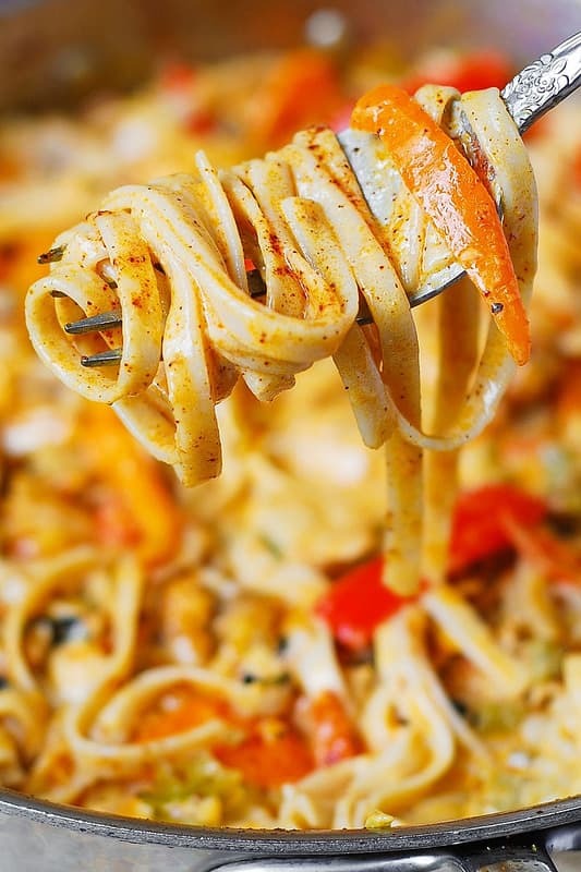 Southwestern chicken pasta with bell peppers in Cheddar and Mozzarella cream sauce