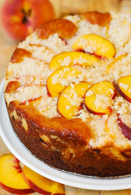 Peach Cream Cheese Cake with Streusel on a large plate