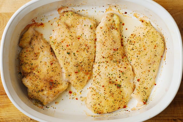 cooked chicken breasts in a casserole dish