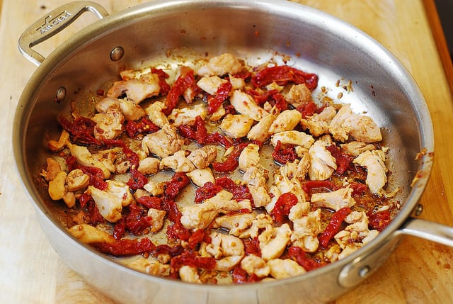 cooking chicken and sun-dried tomatoes in olive oil, gluten free