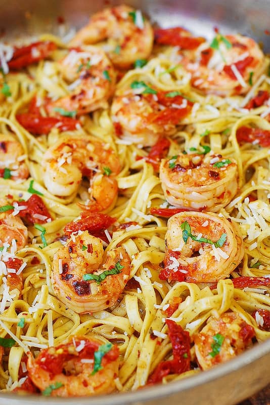 Shrimp Scampi Linguine Pasta with Sun-Dried Tomatoes with Parmesan cheese sprinkled