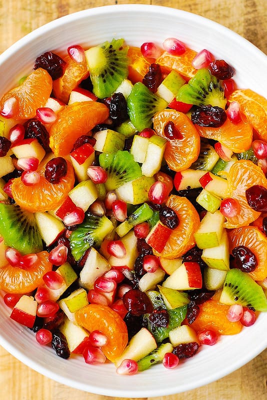 Mandarin or clementine oranges, kiwi fruit, apples, pears, pomegranate seeds, cranberries, maple lime dressing