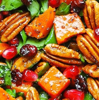 butternut squash and spinach salad with cranberries, pecans, pomegranate seeds