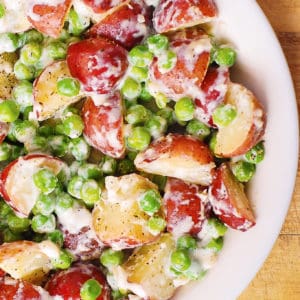 creamy parmesan red potatoes and green peas with garlic