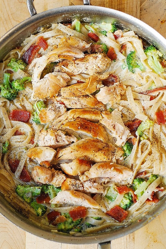 chicken broccoli pasta with bacon in a skillet