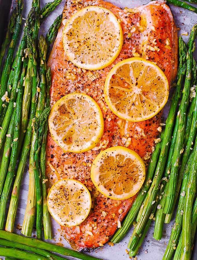 rainbow trout recipe with asparagus on sheet pan