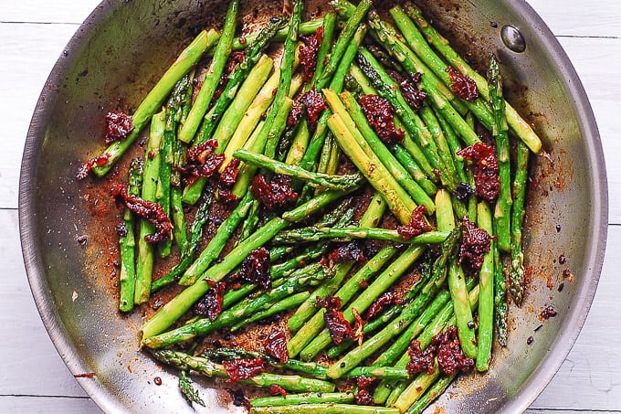 cooked asparagus in a skillet