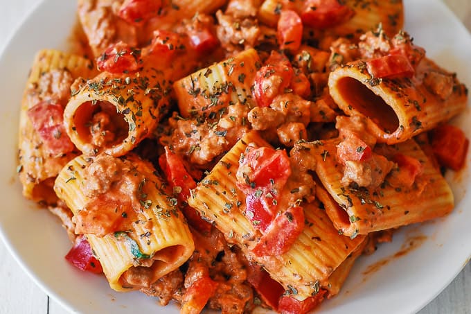 paccheri pasta with tomato cream sauce on a plate