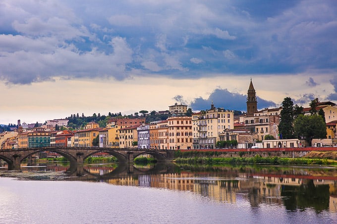 View of buildings and a bridge over the river in Florence, Italy