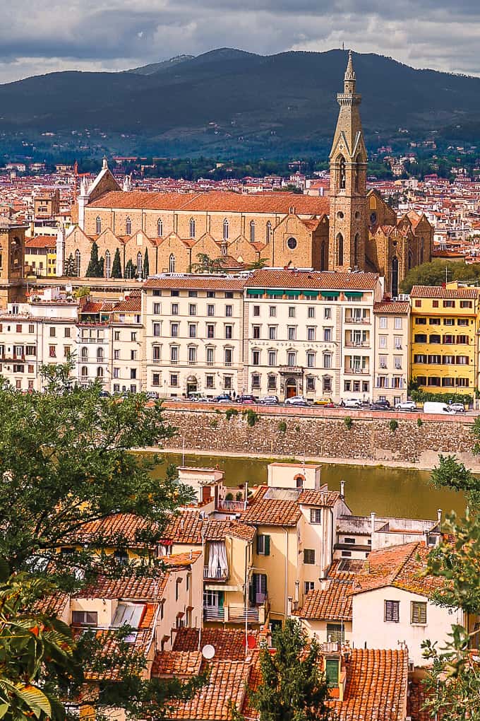 View of historical buildings and a tower from the Michelangelo Square in Florence, Italy
