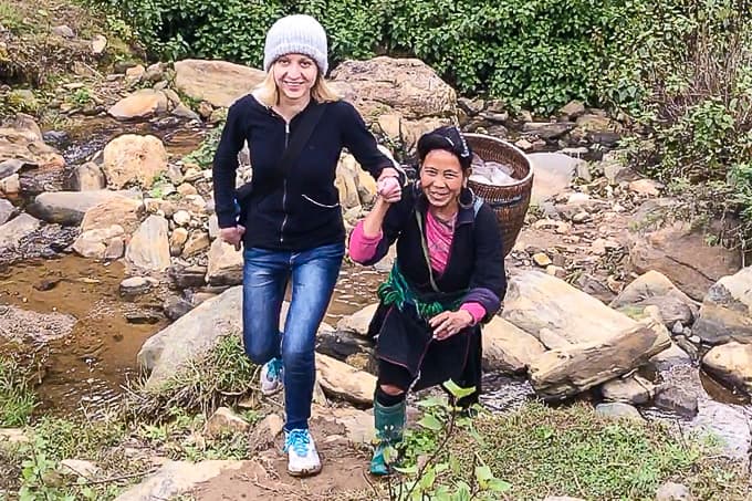 Trekking with Hmong lady in Sapa, Vietnam