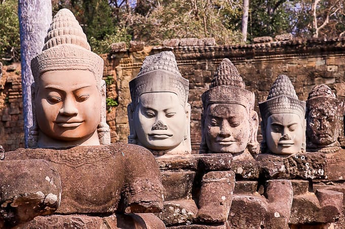 stone figures of mythical beings in Angkor Thom, Cambodia